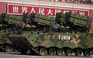 Military vehicles with anti-tank missiles, drive past the Tiananmen Gate during a military parade to mark the 70th anniversary of the end of World War Two on Sept. 3, 2015 in Beijing, China. 