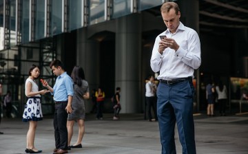 A foreign office worker in Hong Kong takes a break from his work.