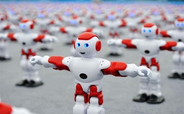 Intelligent robots dance at the main venue for 2016 Qingdao International Beer Festival in Huangdao District of Qingdao, east China's Shandong Province, July 30, 2016. 