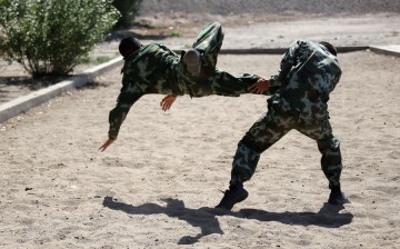 Special Forces soldiers train at their base in Zhangye city, Northwest China's Gansu province, on July 31, 2016, one day before the annual Chinese Army Day on Monday.