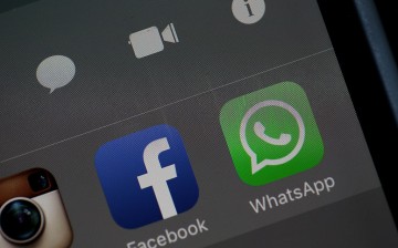In this photo illustration, the WhatsApp application is displayed on a iPhone on April 6, 2016 in San Anselmo, California. Facebook-owned mobile mobile messaging application WhatsApp announced that it has completed end-to-end encryption of of all communic