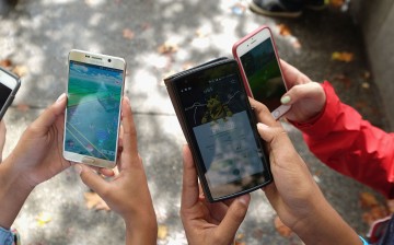 Children play Pokemon Go in Central Park as Pokemon Go craze hits New York City on July 29, 2016 in New York City. 