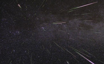 An outburst of Perseid meteors lights up the sky in August 2009 in this time-lapse image. Stargazers expect a similar outburst during next week’s Perseid meteor shower, which will be visible overnight on Aug. 11 and 12.