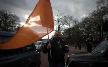 Black taxi drivers in London rally against Uber.