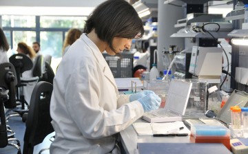 A researcher works at a gene research laboratory in Italy.