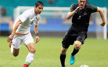 Carlos Cisneros of Mexico is chasing Lukas Klostermann of Germany during the Men's Group C first round match between Mexico and Germany during the Rio 2016 Olympic Games at Arena Fonte Nova on August 4, 2016 in Salvador, Brazil.