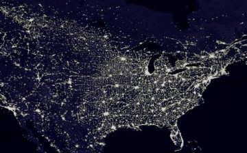 The U.S. power grid system is seen below an overview of a photo taken by satellites from space.