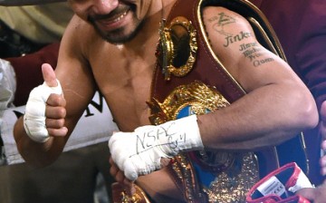Manny Pacquiao gives the thumbs-up sign after beating Timothy Bradley in their third fight last April.