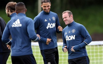 Manchester United players Zlatan Ibrahimović (#9) and Wayne Rooney during training.