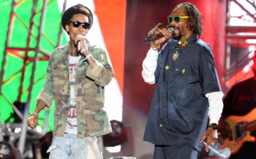 Rappers Wiz Khalifa (L) and Snoop Dogg perform onstage during day 3 of the 2012 Coachella Valley Music & Arts Festival at the Empire Polo Field on April 15, 2012 in California.  