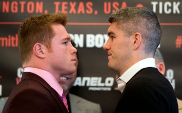 Canelo Alverez (L) and Liam Smith (R) square up during the Canelo Alvarez vs Liam Smith boxing press conference at The Landmark Hotel on July 20, 2016 in London, England.