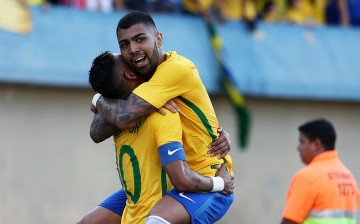Brazil forward Gabriel Barbosa hugs teammate Neymar during a recent Olympic game.