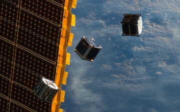 CubeSat trio in space.