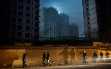 China is facing a real estate crisis because of slow urbanization.