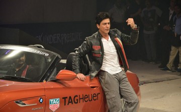 Bollywood actor Shah Rukh Khan, the brand ambassador for TAG Heuer watches, flashes the new Aquaracer 300m Automatic Chronograph on his wrist in Mumbai.