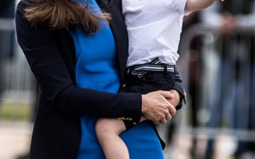 Catherine, Duchess of Cambridge and Prince George during a visit to the Royal International Air Tattoo at RAF Fairford on July 8, 2016 in Fairford, England.