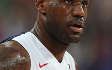 LeBron James, during his last stint with Team USA, looks on during the gold medal game in the London Olympics.
