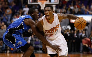 Eric Bledsoe #2 of the Phoenix Suns drives the ball against Victor Oladipo #5 of the Orlando Magic during the second half of the NBA game at Talking Stick Resort Arena on December 9, 2015 in Phoenix, Arizona.