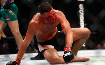  Nate Diaz gets up from the canvas during his welterweight rematch against Conor McGregor at the UFC 202 event at T-Mobile Arena on August 20, 2016 in Las Vegas, Nevada. McGregor won by majority decision.