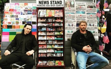 Tom Hiddleston (left) and Chris Hemsworth on the set of 