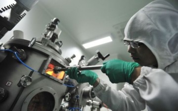 Chinese researcher at a research lab.