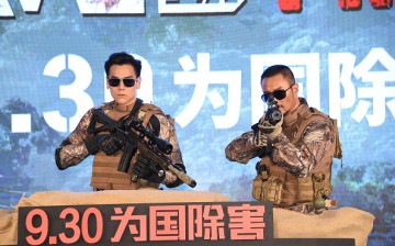 Actor Eddie Peng (L) and actor Zhang Hanyu attend press conference of new film 'Operation Mekong' on August 24, 2016 in Beijing, China.