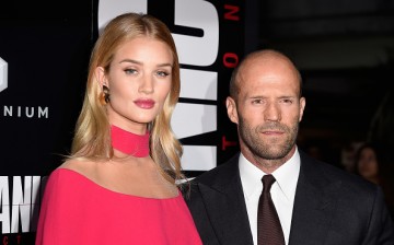 Actors Rosie Huntington-Whiteley (L) and Jason Statham arrives at the Premiere of Summit Entertainment's 'Mechanic: Resurrection' at ArcLight Hollywood on August 22, 2016 in Hollywood, California.   