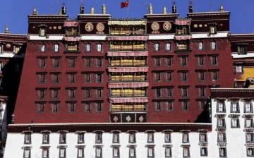 The Chinese national flag is hoisted on top the iconic Potala Palace in Tibet. 
