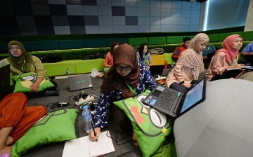 New recruits attend a training session at PT Tokopedia's offices in Jakarta, Indonesia.