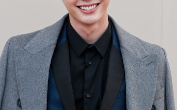 Lee Jong Suk attends the Burberry show during The London Collections Men AW16 at Kensington Gardens on January 11, 2016 in London, England.