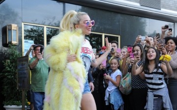 Lady Gaga wears short shorts and a large fur coat steps out in Manhattan on May 11, 2016 in New York, New York. 