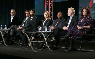 (L-R) Executive Producer Rob Thomas, actors Robert Buckley, Rahul Kohli, Rose McIver, Malcolm Goodwin and David Anders and executive producer Diane Ruggiero-Wright listen onstage to a question from the media audience during the 'iZombie' panel in 2015.  