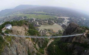 Hunan's glass bridge draws more than 10,000 tourists a day.