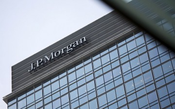 A signage of J.P. Morgan headquarters is displayed atop Chater House in the central business district of Hong Kong.