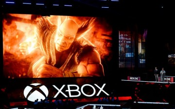 Katsuhiro Harada, and Michael Murray introduce 'Tekken7' video game during Microsoft Corp. Xbox at the Galen Center on June 13, 2016 in Los Angeles, California.