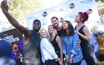  Dancers Keo Motsepe, Witney Carson, Lindsay Arnold, Valentin Chmerkovskiy and Sharna Burgess pose with a fan at The Grove Hosts Dancing With The Stars Dance Lab With pros Val Chmerkovskiy, Whitney Carson and Sharna Burgess at The Grove on August 17, 2016