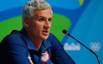 Ryan Lochte attends a press conference during the Main Press Center on Day 7 of the Rio Olympics on August 12, 2016 in Rio de Janeiro, Brazil.