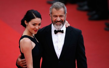 Mel Gibson (R) and Rosalind Ross attend the closing ceremony of the 69th annual Cannes Film Festival at the Palais des Festivals on May 22, 2016 in Cannes, France. 