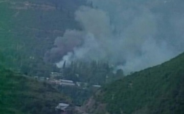 Smoke rises from Indian Army camp at Uri attacked by Kashmiri Muslim militants.