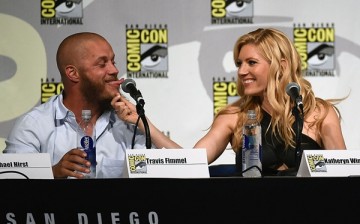Katheryn Winnick pulls on actor Travis Fimmel's beard as they joke around during a panel for the History series 'Vikings' during Comic-Con International 2015 at the San Diego Convention Center on July 10, 2015 in San Diego, California.