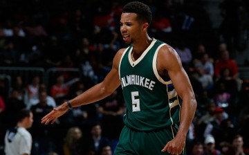 Michael Carter-Williams of the Milwaukee Bucks reacts after a basket in the second overtime of their 117-109 win over the Atlanta Hawks.