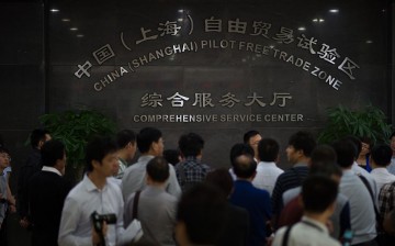 People mill around the comprehensive service center at Shanghai Free Trade Zone.