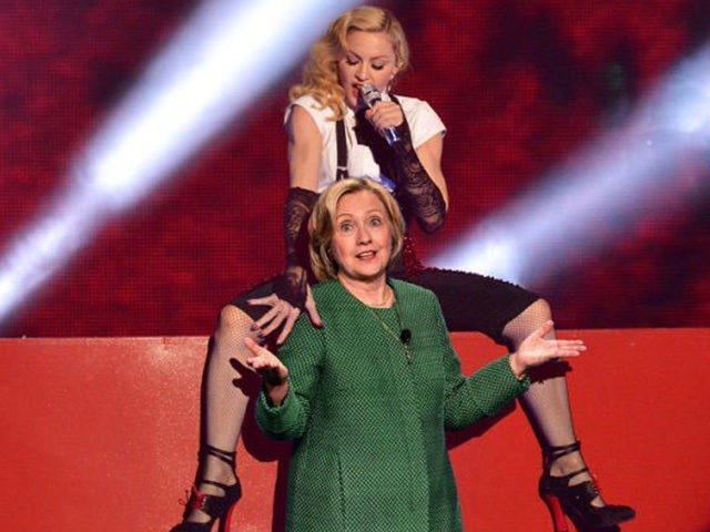 The “Material Girl” singer also posted earlier a photo from her 2015 Brit Awards performance in which Hillary Clinton is photoshopped under her. 