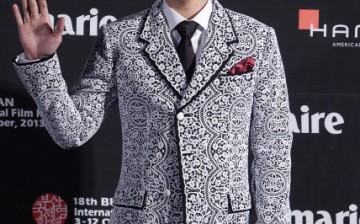 T.O.P of Bigbang arrives for the marie claire Asia Star Awards during the 18th Busan International Film Festival on October 5, 2013 in Busan, South Korea.   