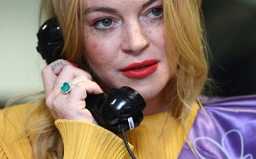 Lindsay Lohan making a trade at BGC Annual Global Charity Day at Canary Wharf on September 12, 2016 in London, England. 