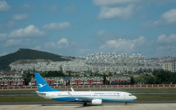 A Boeing 737 of Xiamen Airlines is parked at Dalian Airport.