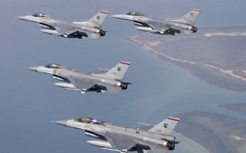 Republic of Singapore Air Force F-16Cs and an F-16D in formation.