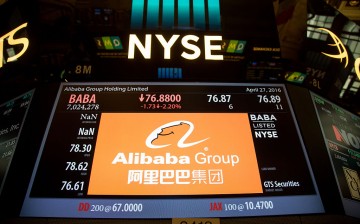 An Alibaba signage shows trading activity at the New York Stock Exchange.