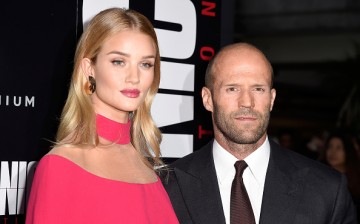 Rosie Huntington-Whiteley (L) and Jason Statham arrives at the Premiere of Summit Entertainment's 'Mechanic: Resurrection' at ArcLight Hollywood on August 22, 2016 in Hollywood, California.   