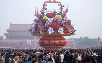 Chinese celebrate the National Day on Oct. 1.